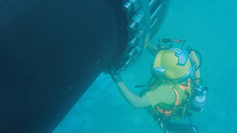 Connection by divers of the pipe spools in the seabed with the pre-welded flange connections. Photocredit AAMM France