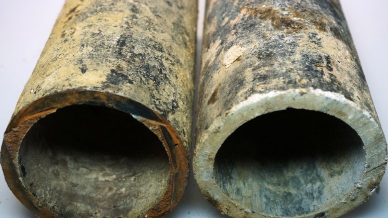 Old steel (left) and asbestos cement (right) pipes.