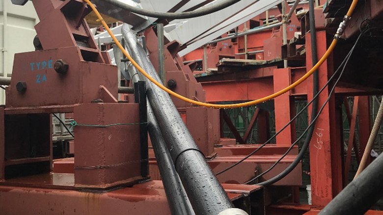  The water line was attached to the roof supported by pipe clips.
