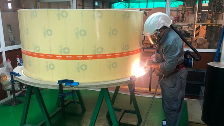Hot-gas welding of ECTFE fabric backed sheets
