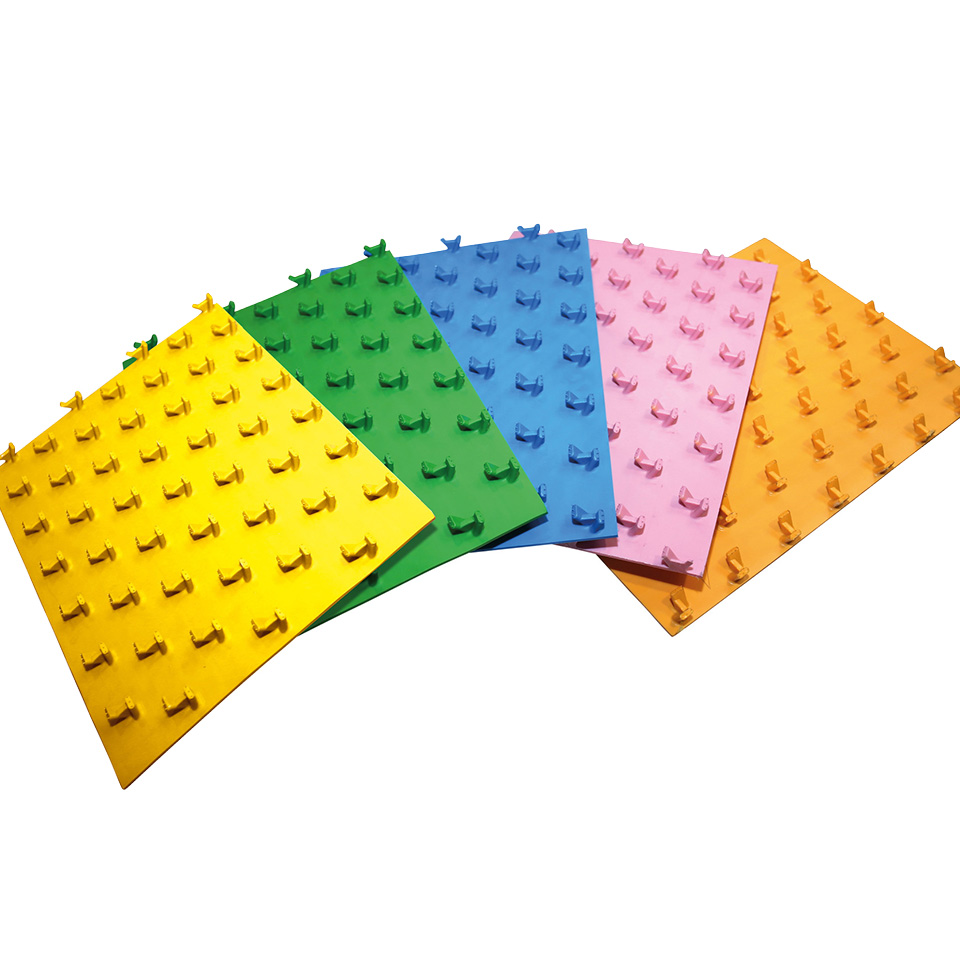 Five colored plastic panels with evenly arranged holders displayed in a fan-shaped layout on a light background.